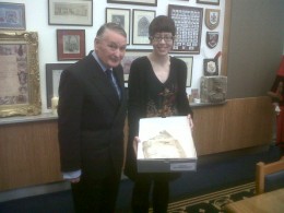 Sir Donal with the folio from the Great Parchment Book