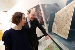 Studying a 17th century map from the Derry City Council archives