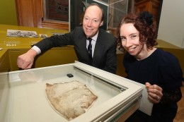Bernadette and Edward with an original folio of the Great Parchment Book